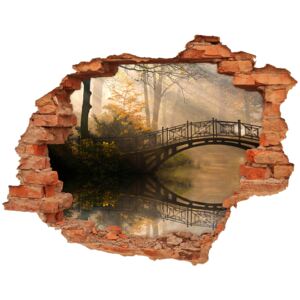Dziura 3d w ścianie naklejka Stary most jesienią
