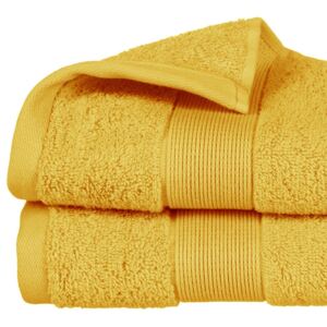 Żółty ręcznik łazienkowy z bawełny o grubym splocie, ręcznik z bordiurą w modnym odcieniu ochry