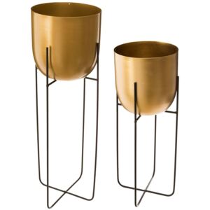 Zestaw składający się z dwóch doniczek w kolorze złotym umieszczonych na metalowym stojaku