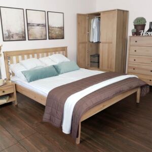 Drewniane łóżko do sypialni z wysokim zagłówkiem Gres